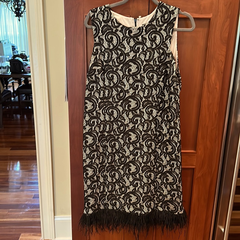 Donna Ricco New York- black lace over cream with feather bottom. Like new. Sz16